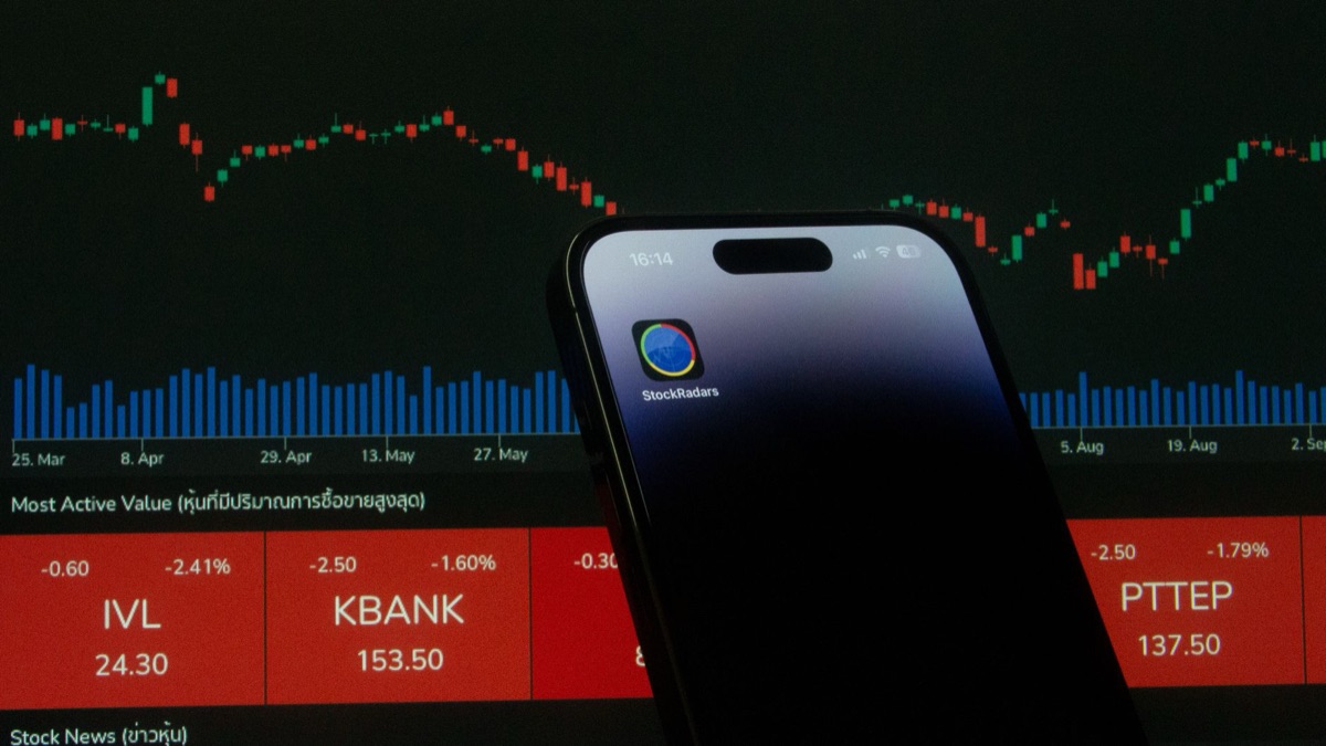 Person using a mobile smartphone for cryptocurrency trading
