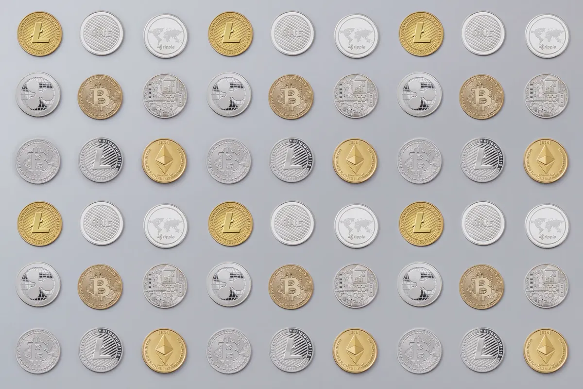 A seamless pattern of various cryptocurrency coins in gold and silver tones.